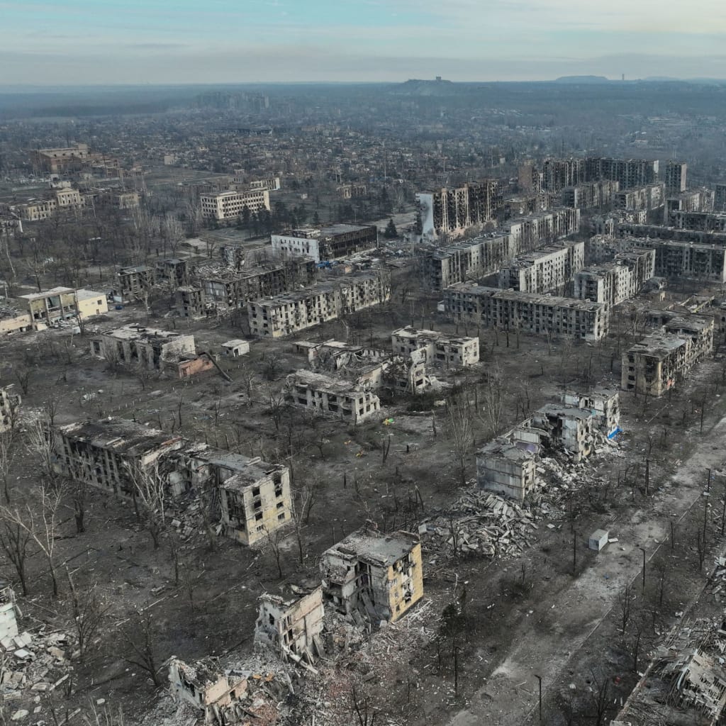 <p>A drone image shows residential and administrative buildings destroyed by Russian air strikes in Toretsk, Ukraine.</p>
