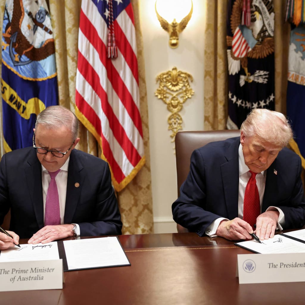 <p>U.S. President Donald Trump and Australia’s Prime Minister Anthony Albanese sign an agreement on rare earth and critical minerals during a meeting in the Cabinet Room at the White House, in Washington, D.C., U.S., October 20, 2025.</p>
