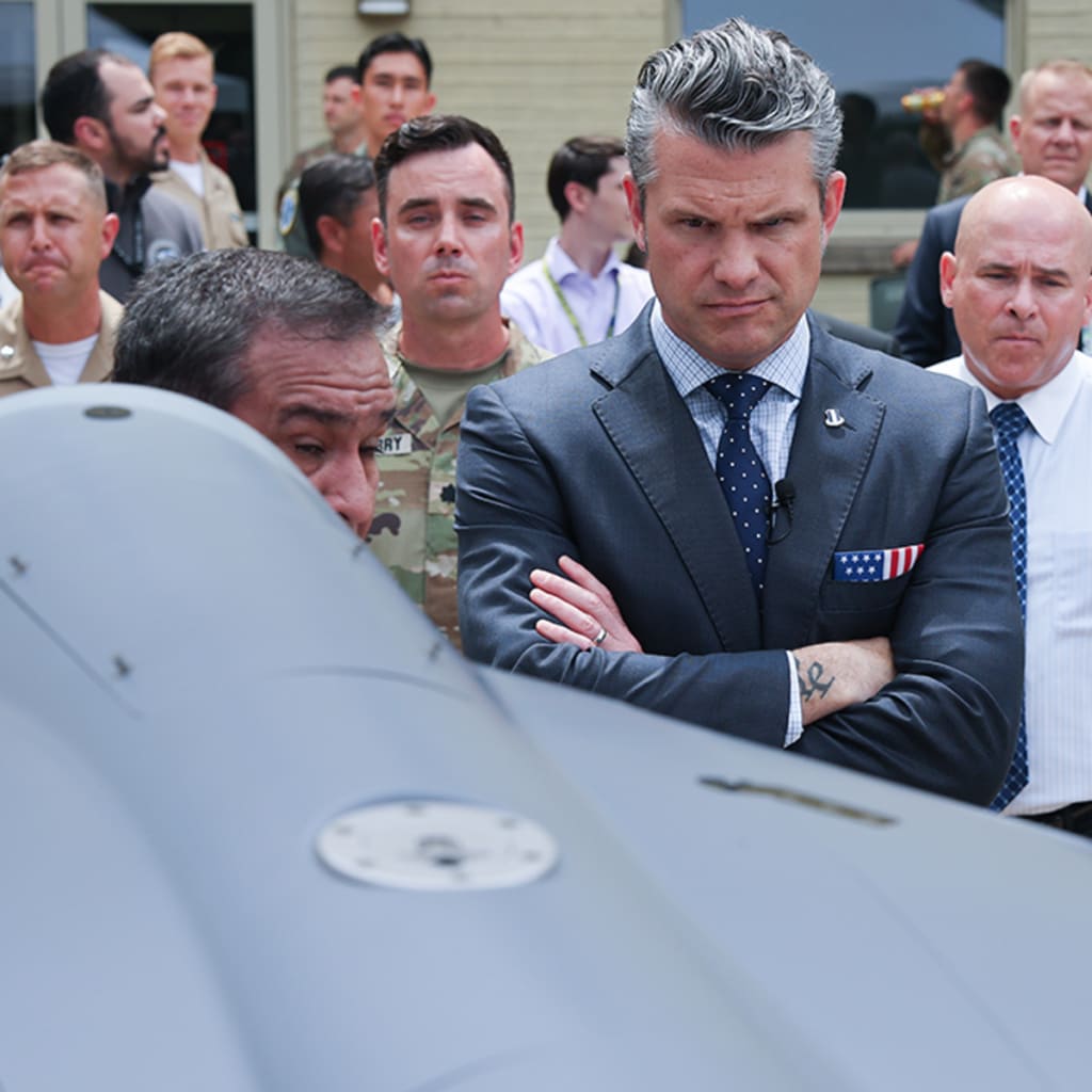 <p>U.S. Secretary of Defense Pete Hegseth is briefed on an exhibit of Multi-Domain Autonomous systems.</p>
