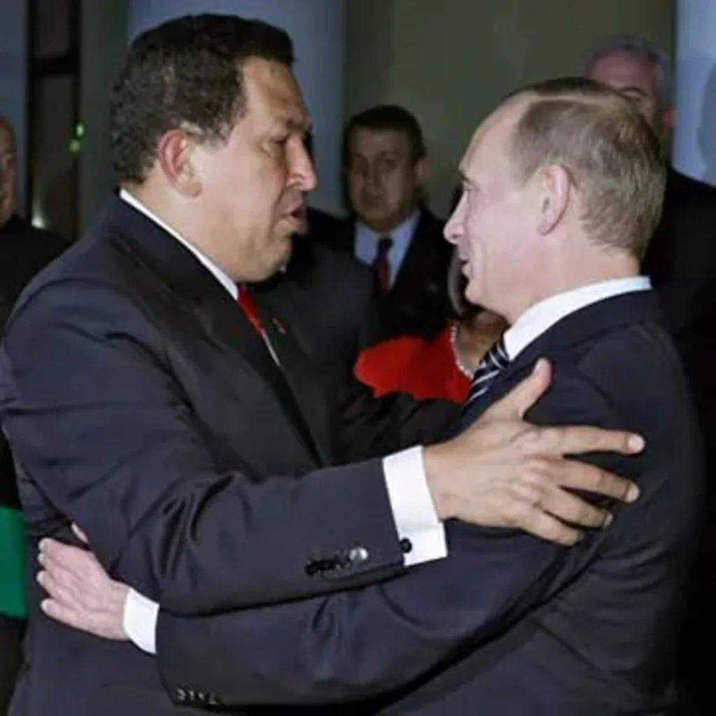 Then Russian Prime Minister Vladimir Putin and Chavez embrace after September 2009 talks. 
