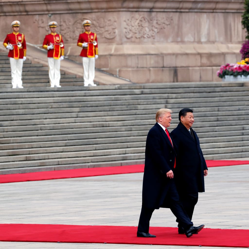<p>U.S. President Donald Trump and Chinese President Xi Jinping at a welcoming ceremony in Beijing, China, November 9, 2017. </p>
