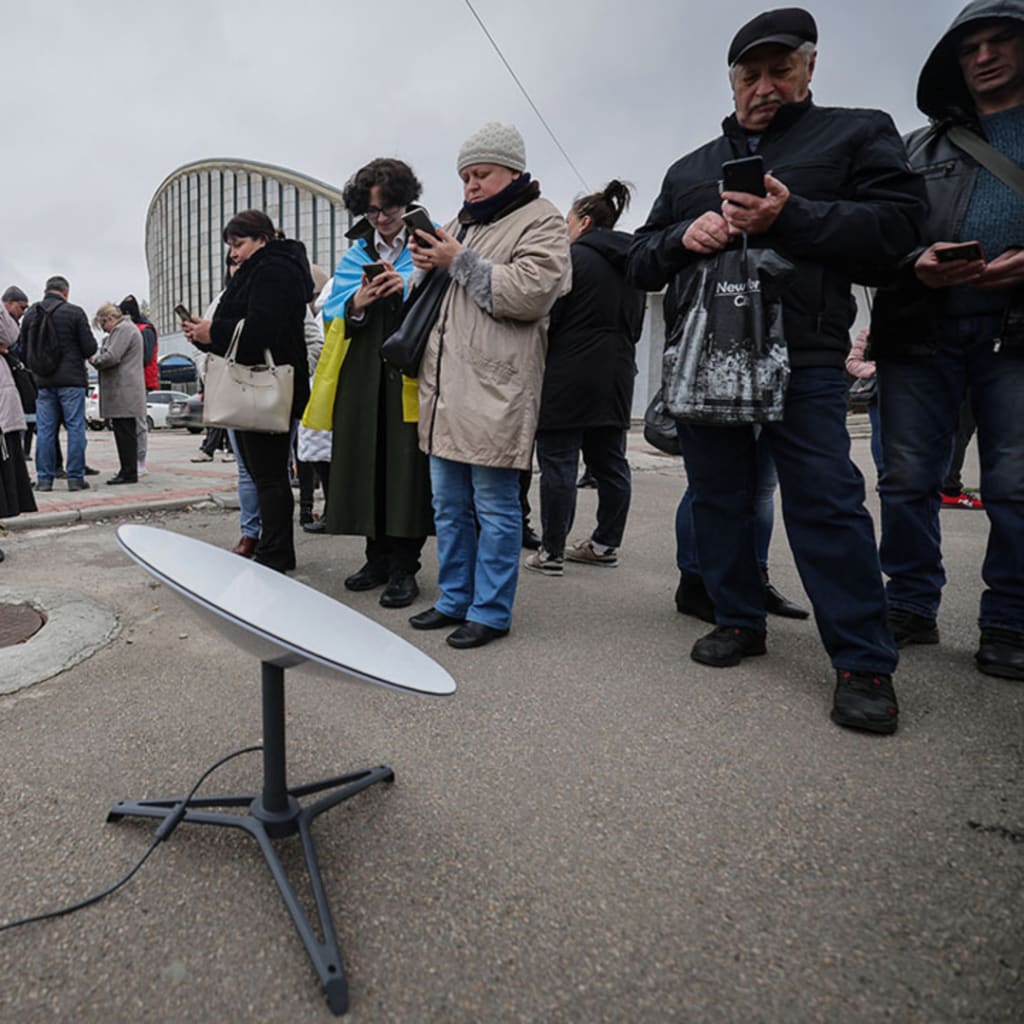 <p>Local residents use the internet from the Starlink network, set up by the Ukrainian army.</p>
