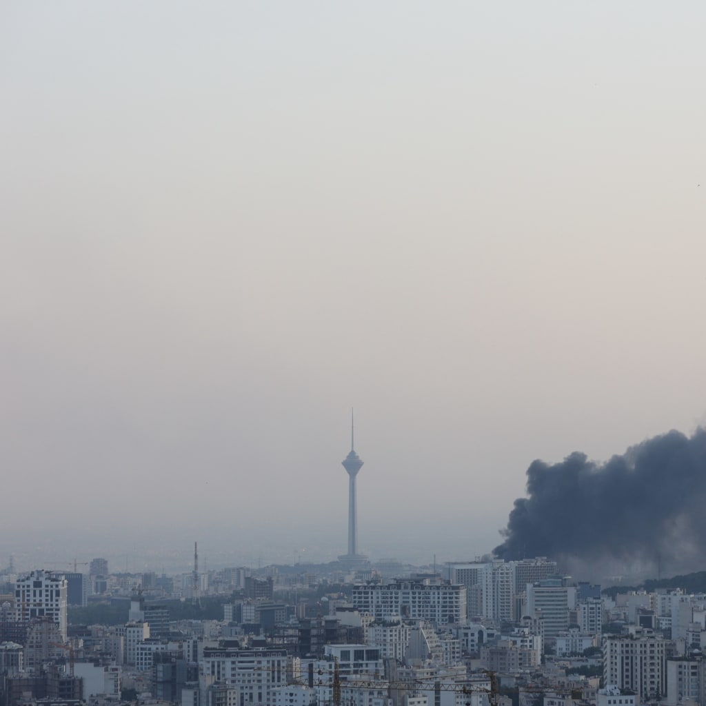 <p>Smoke rises after an Israeli air strike on the Tehran building housing Iran’s state broadcaster on June 16, 2025.</p>
