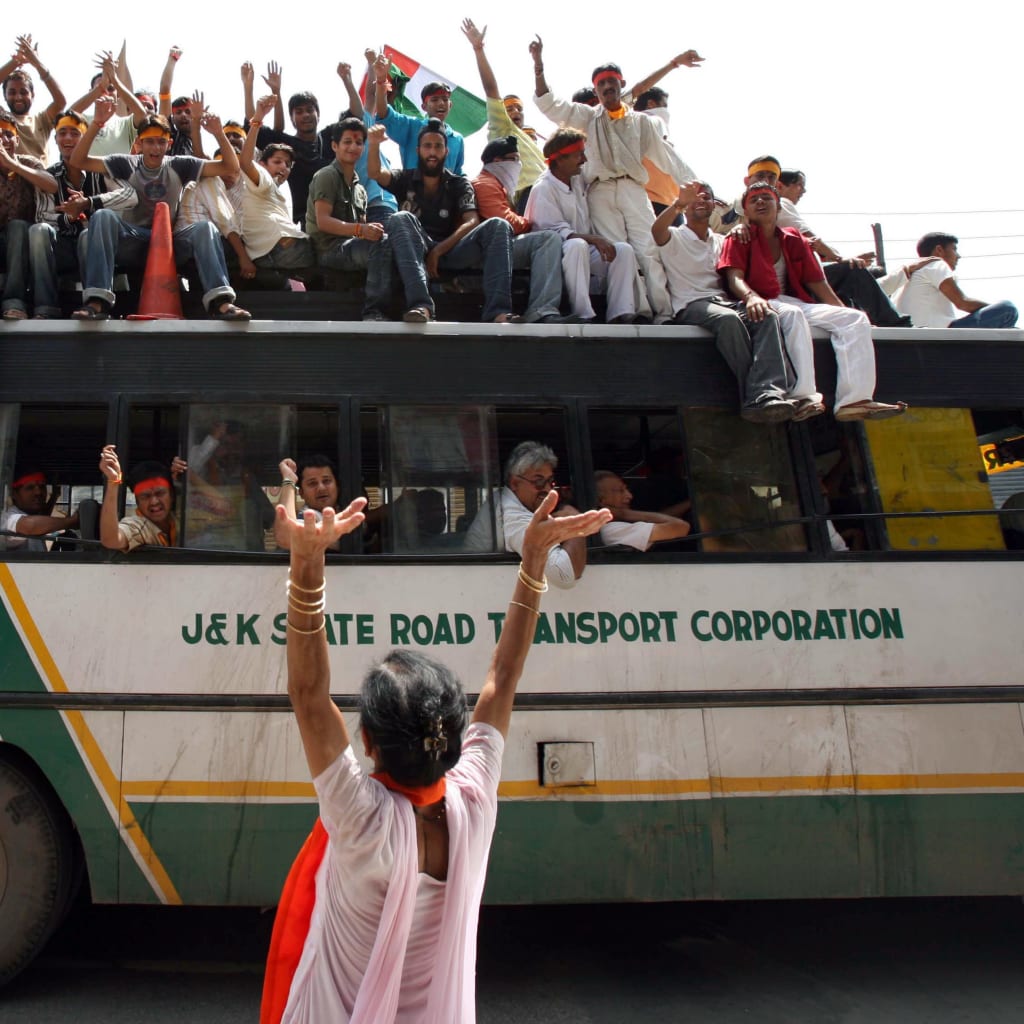 <p>Demonstrators shout during a protest in Jammu and Kashmir.</p>
