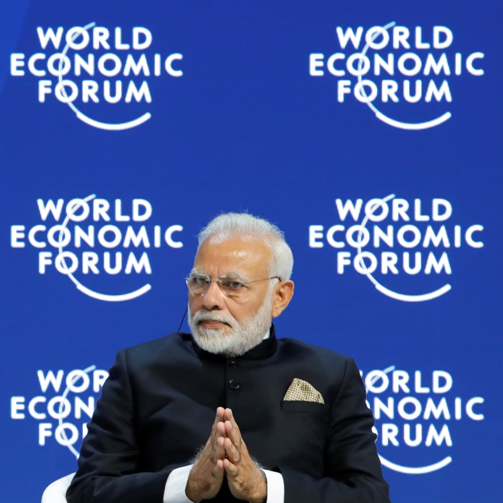 <p>India’s Prime Minister Narendra Modi gestures as he attends the Opening Plenary during the World Economic Forum (WEF) annual meeting in Davos, Switzerland, January 23, 2018.</p>

