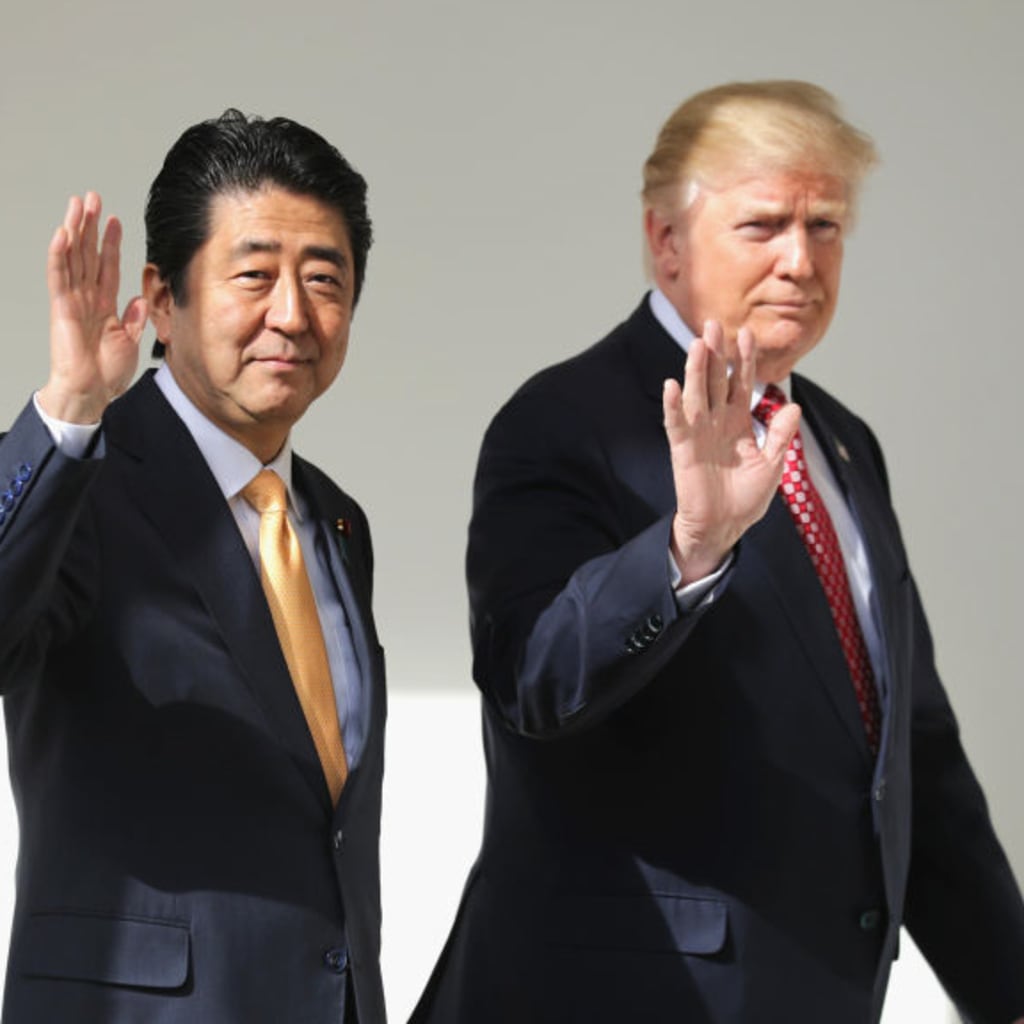 <p>U.S. President Donald Trump and Japan Prime Minister Shinzo Abe walk to their joint press conference at the White House on February 10, 2017.</p>
