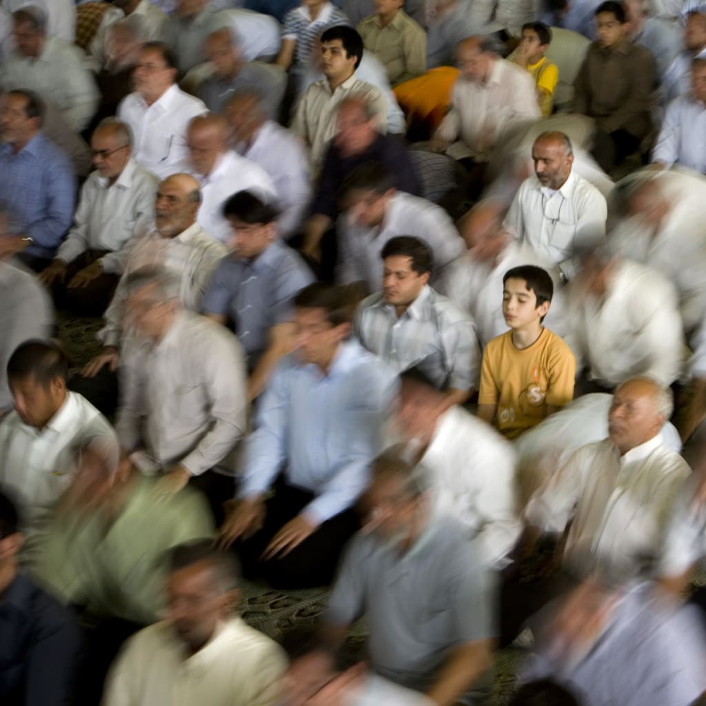 <p>Iranian worshippers pray during Friday prayers in Tehran.</p>
