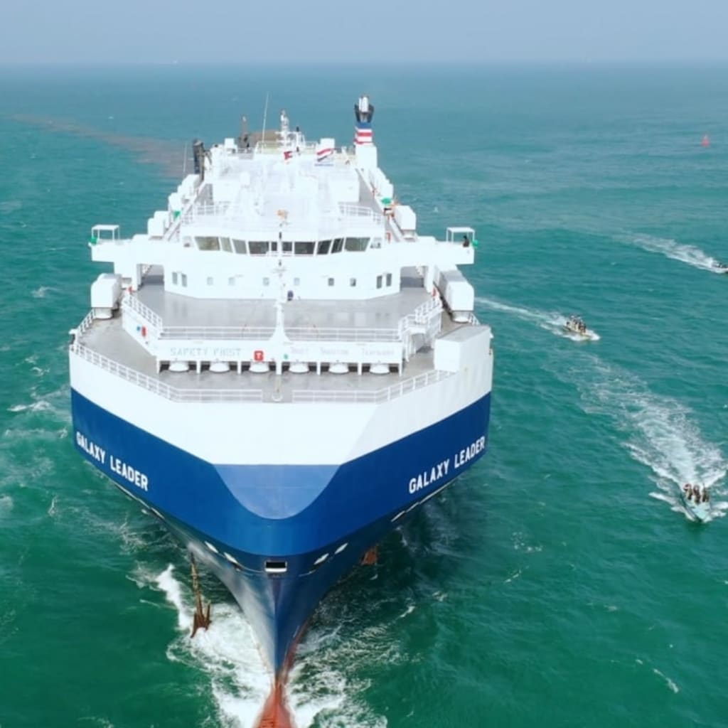 <p>The Galaxy Leader, a commercial-vehicle carrier seized by Houthi commandos in the Red Sea, as seen on November 20, 2023, the day after its hijacking.</p>
