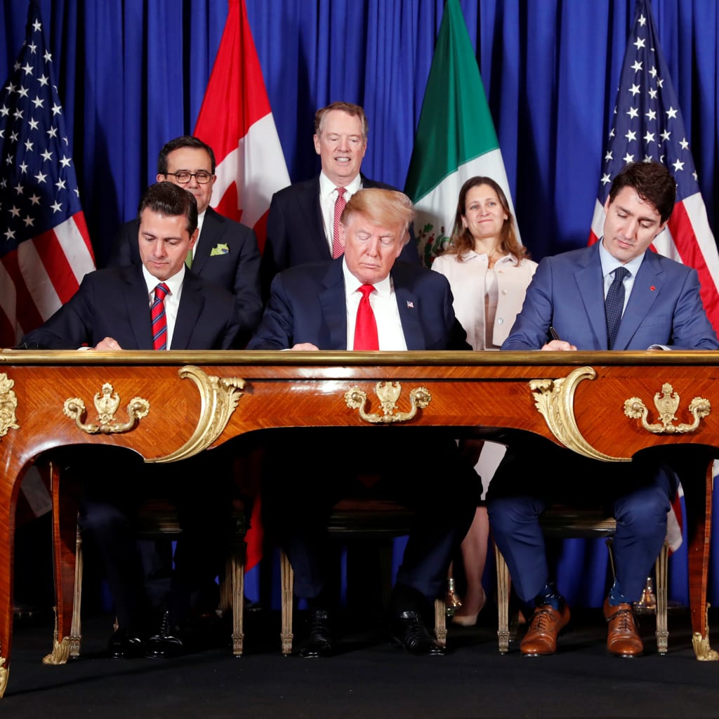 <p>U.S. President Donald J. Trump, Canadian Prime Minister Justin Trudeau, and former Mexican President Enrique Pena Nieto sign the United States-Mexico-Canada Agreement.</p>
