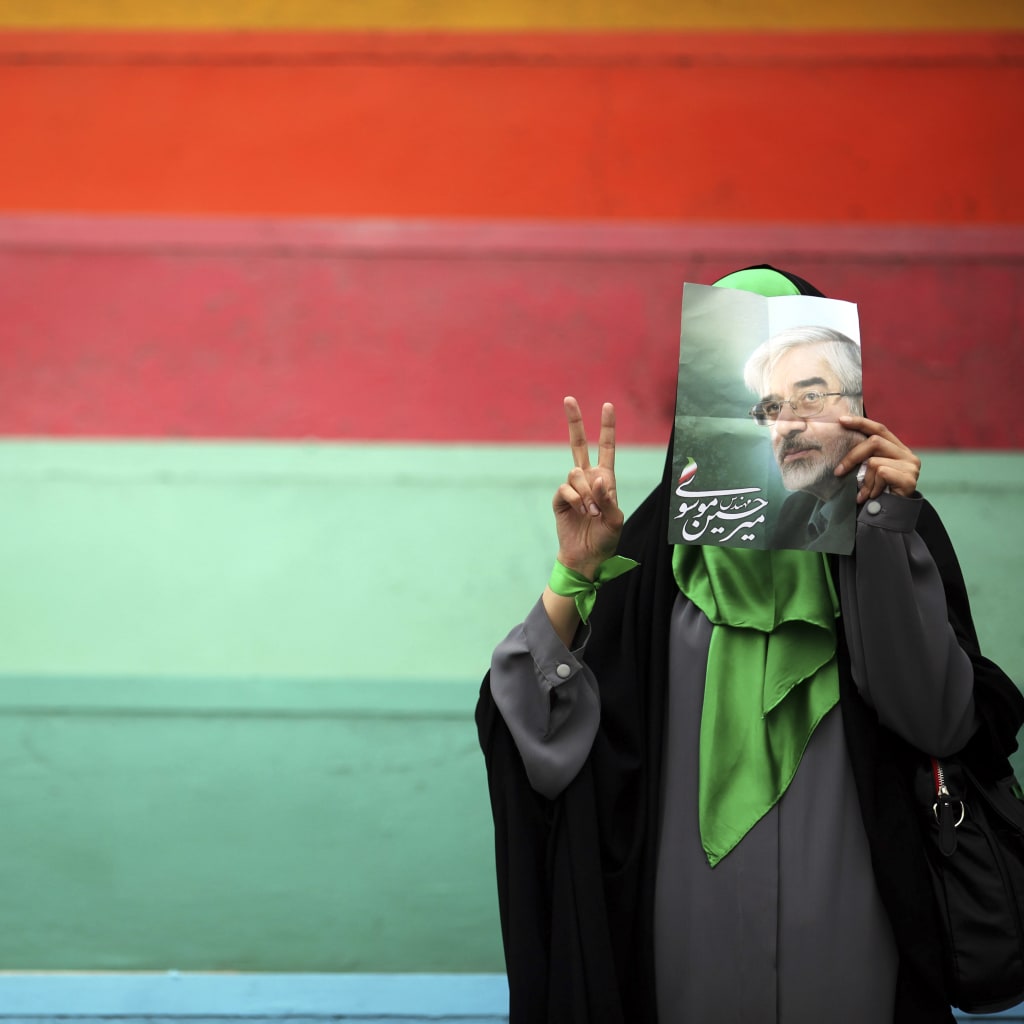 <p>An Iranian woman supporting former prime Minister Mirhossein Mousavi.</p>