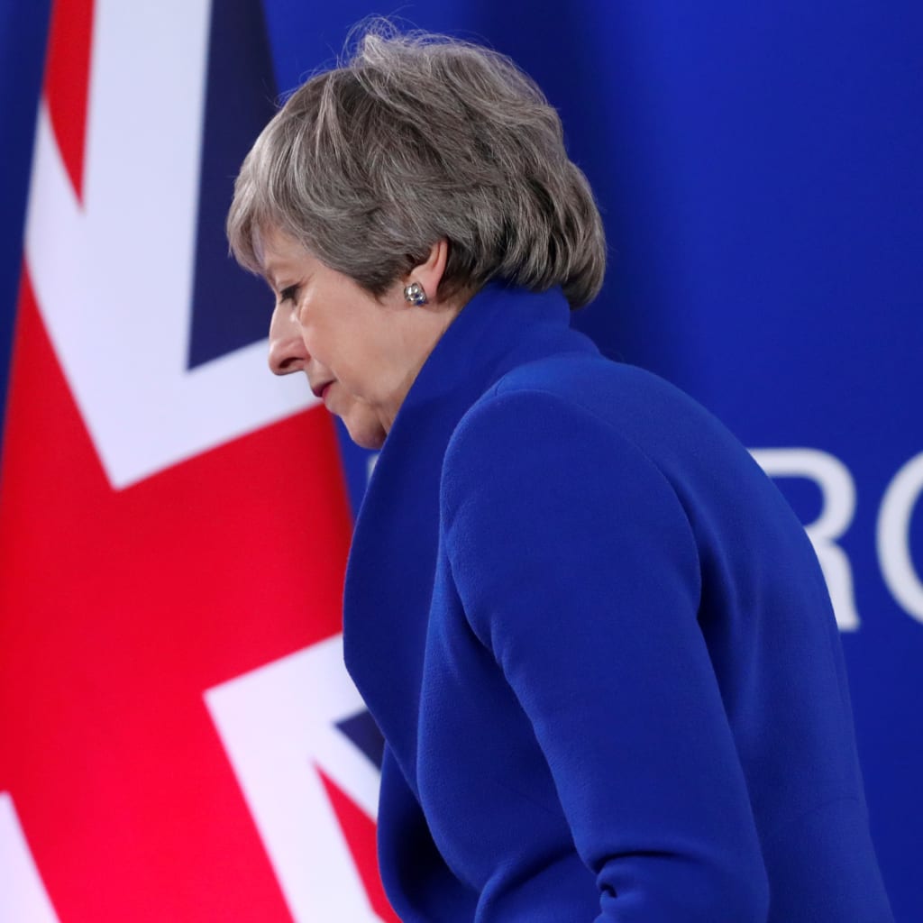 <p>British Prime Minister Theresa May leaves after holding a news conference to discuss Brexit.</p>