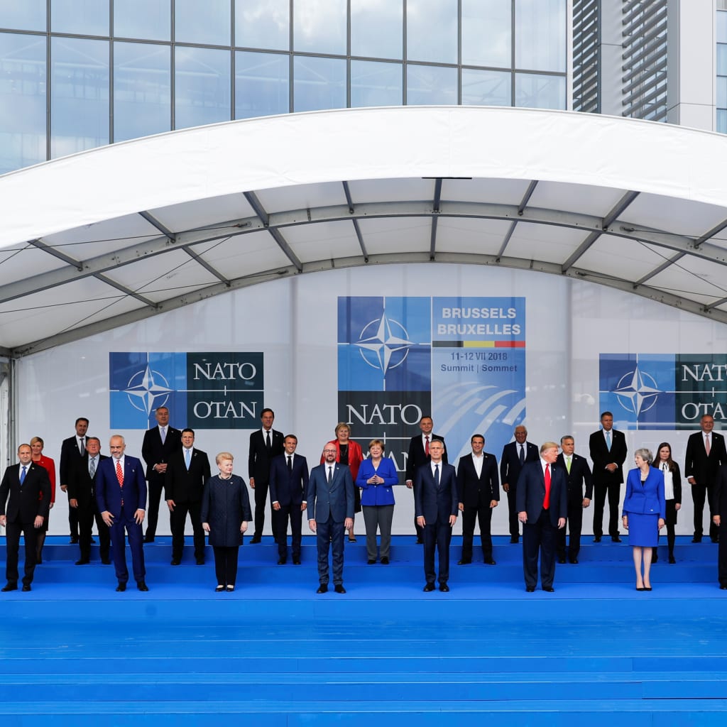 <p>NATO leaders pose for a photo in Brussels.</p>