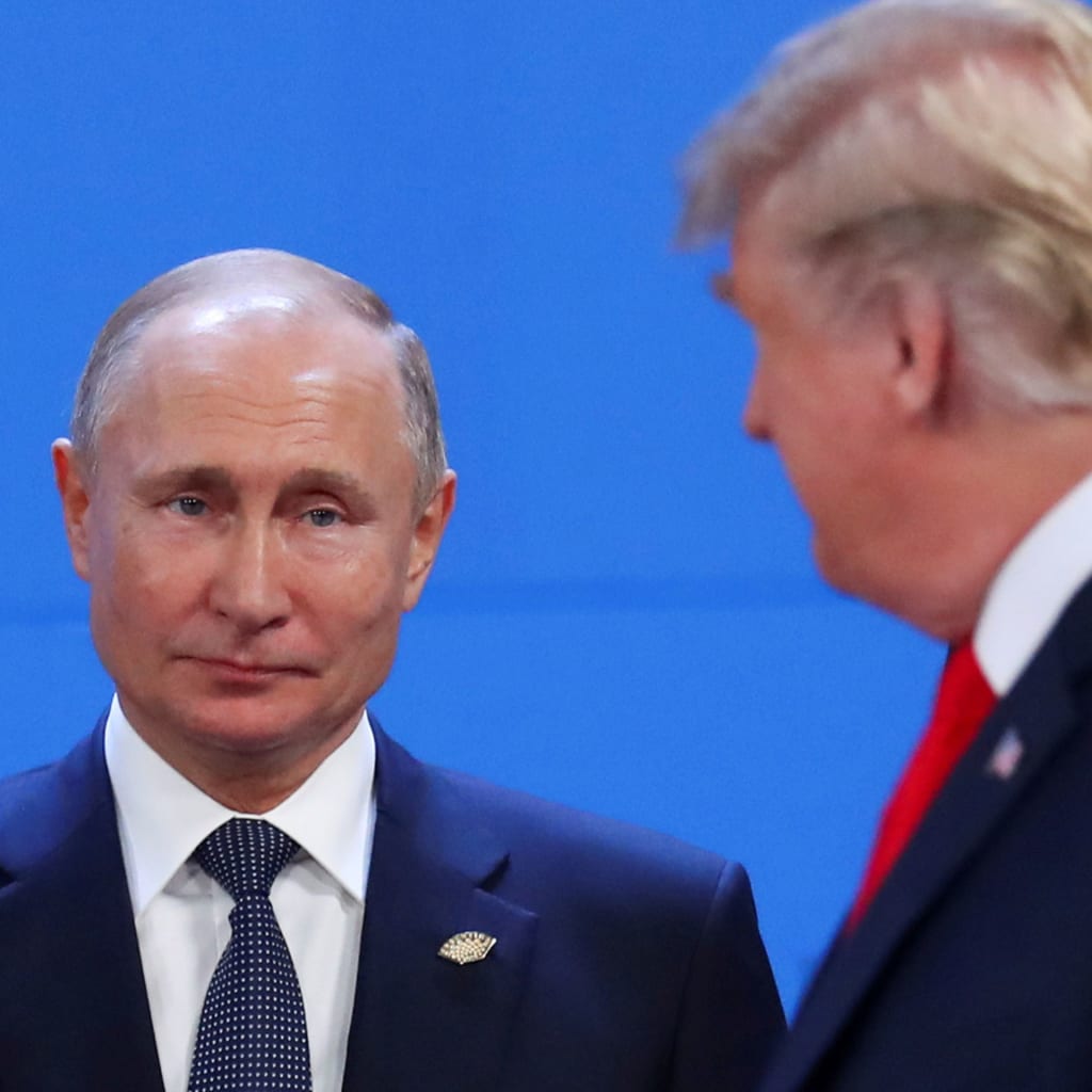 <p>U.S. President Donald Trump and Russia’s President Vladimir Putin are seen during the G20 leaders summit in Buenos Aires, Argentina November 30, 2018.</p>
