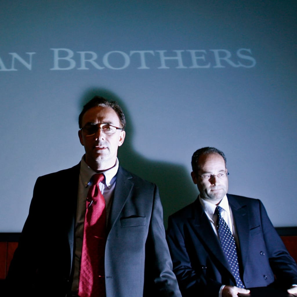<p>Auditors for Lehman Brothers pose during a news conference at Lehman Brothers in London, September 15, 2008.</p>
