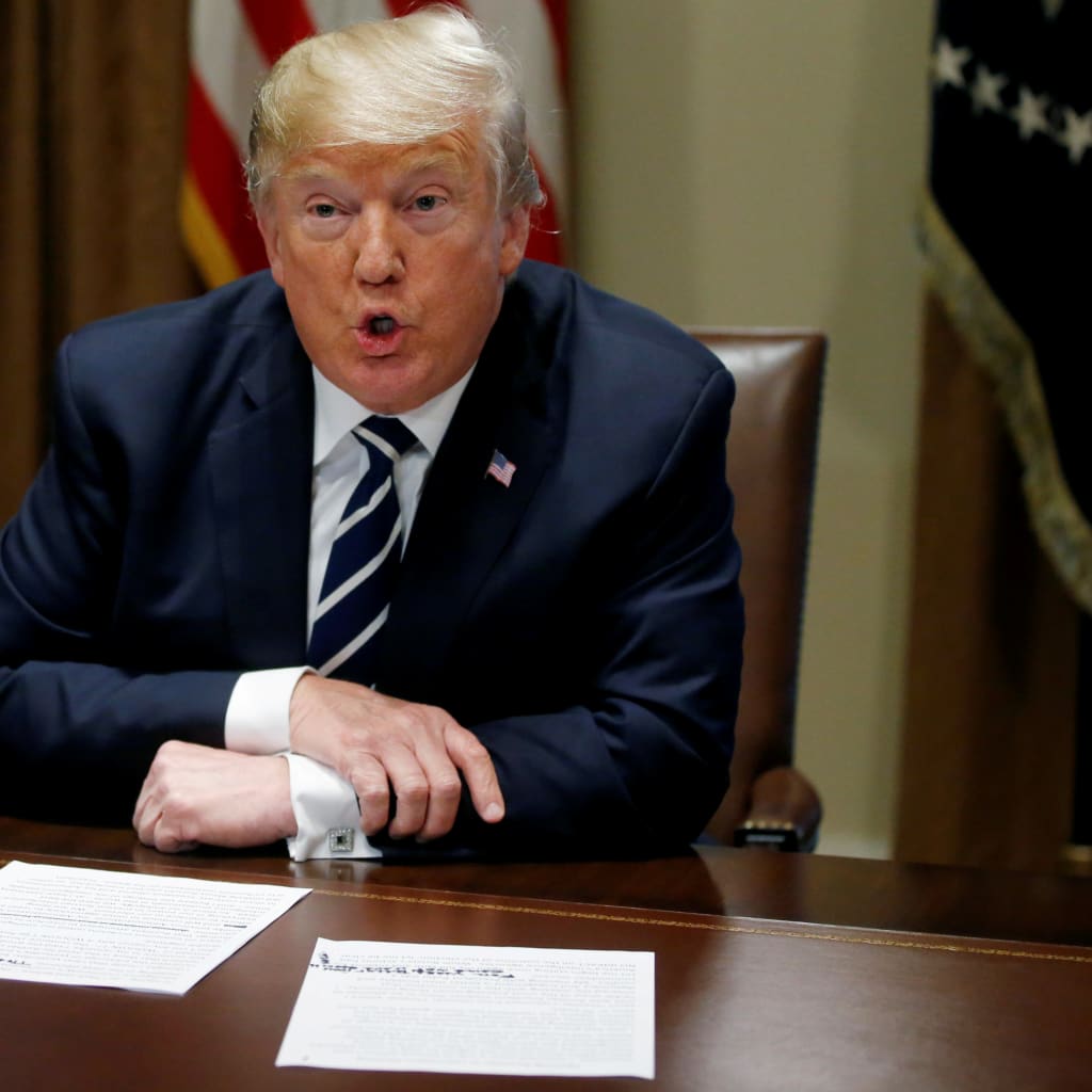 <p>U.S. President Donald Trump speaks at the White House about his summit with Russia’s president Vladimir Putin, July 17, 2018.</p>
