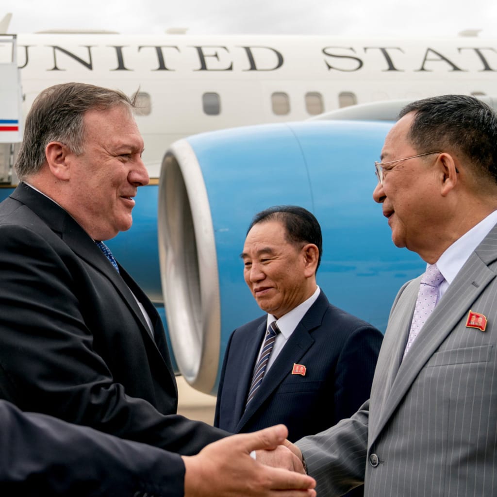 <p>U.S. Secretary of State Mike Pompeo shakes hands with North Korean Foreign Minister Ri Yong Ho as he arrives in Pyongyang on July 6. </p>
