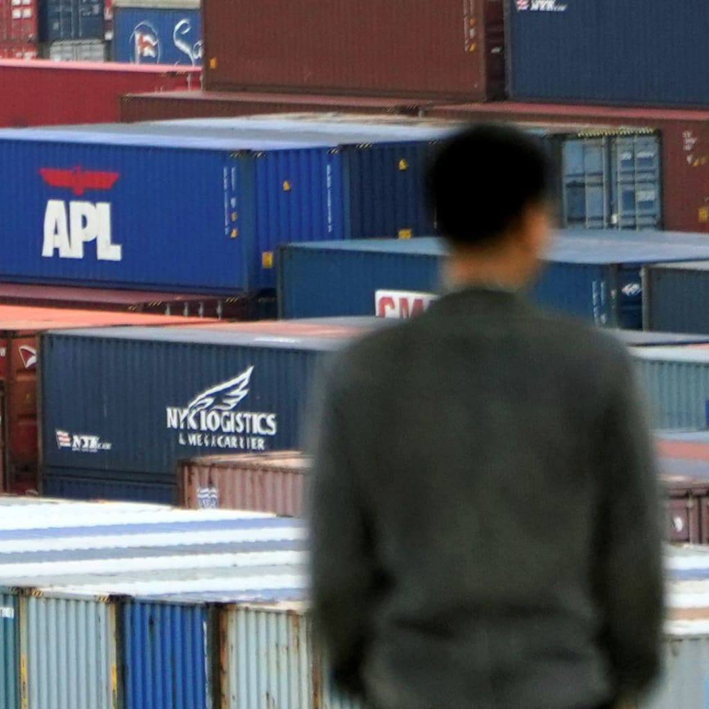 <p>Shipping containers at the Yangshan Deep Water Port in Shanghai.</p>
