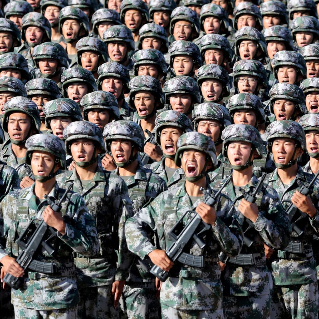 <p>Soldiers of China’s People’s Liberation Army (PLA) get ready for the military parade to commemorate the 90th anniversary of the foundation of the army at Zhurihe military training base in Inner Mongolia Autonomous Region, China, July 30, 2017.</p>
