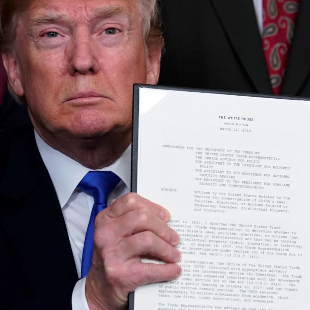 <p>President Trump signs a memo regarding tariffs on Chinese goods. </p>

