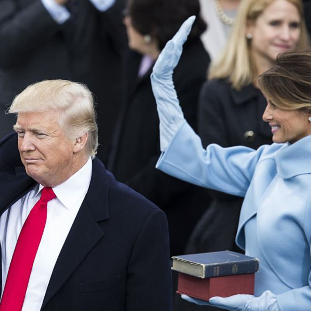 <p>President Donald Trump and First Lady Melania Trump wave to the crowds during the 58th U.S. Presidential Inauguration. </p>

