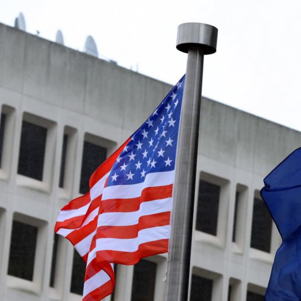 <p>The national flag of the United States flies with the European Union flag in Brussels, Belgium.</p>
