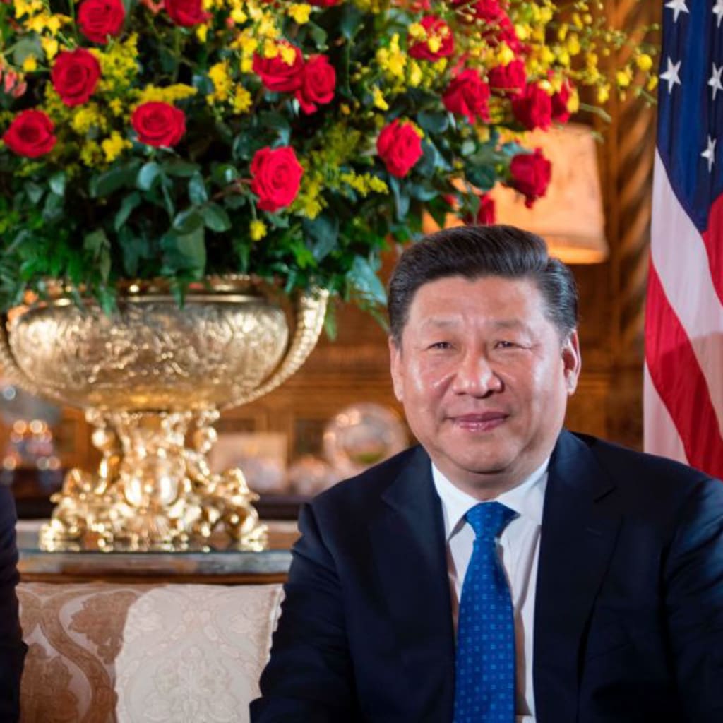 <p>US President Donald Trump (L) sits with Chinese President Xi Jinping (R) during a bilateral meeting at the Mar-a-Lago estate in Florida.</p>
