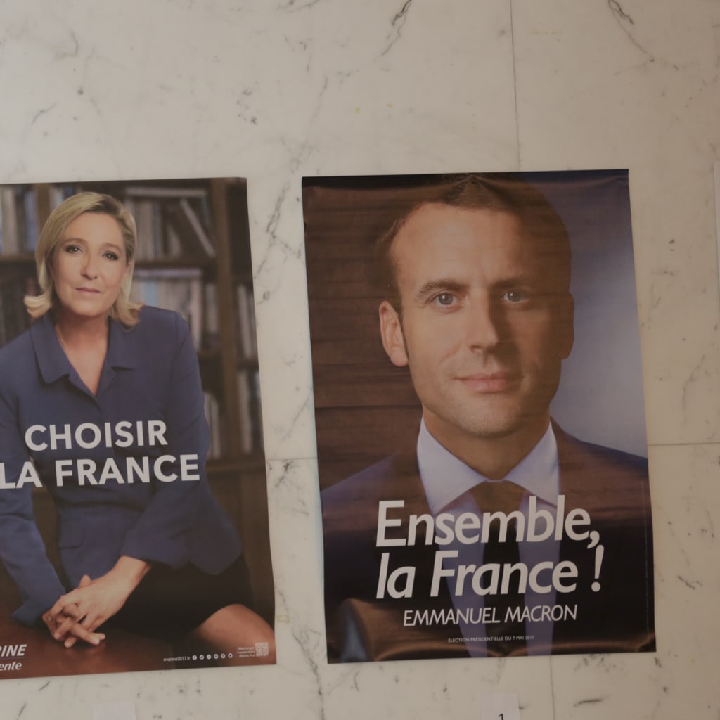 <p>Campaign posters on display for presidential candidates Marine Le Pen and Emmanuel Macron during the second round of the French presidential election.</p>
