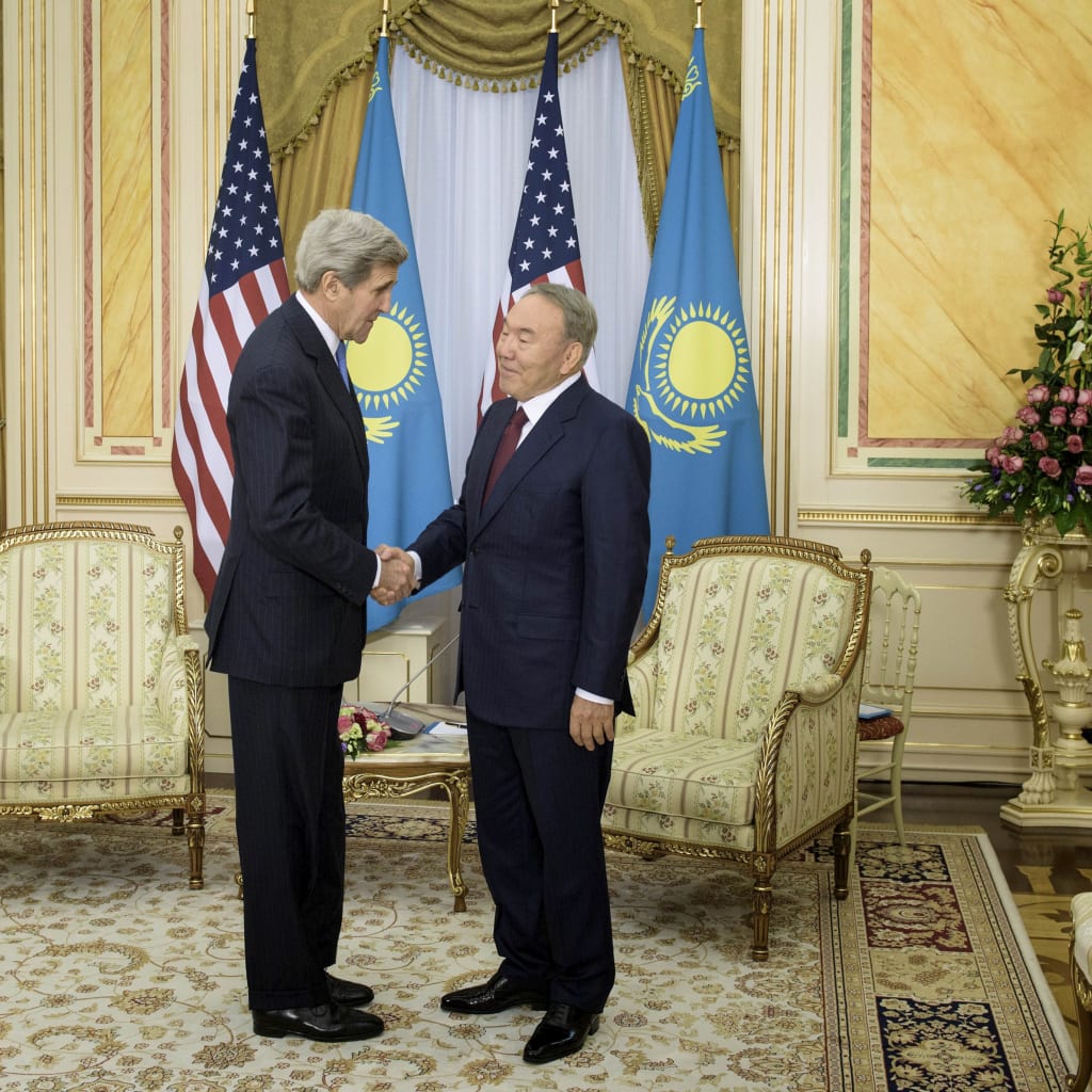 <p>U.S. Secretary of State John Kerry and Kazakh President Nursultan Nazarbayev shake hands before a meeting at the Presidential Palace in Astana, November 2, 2015.</p>
