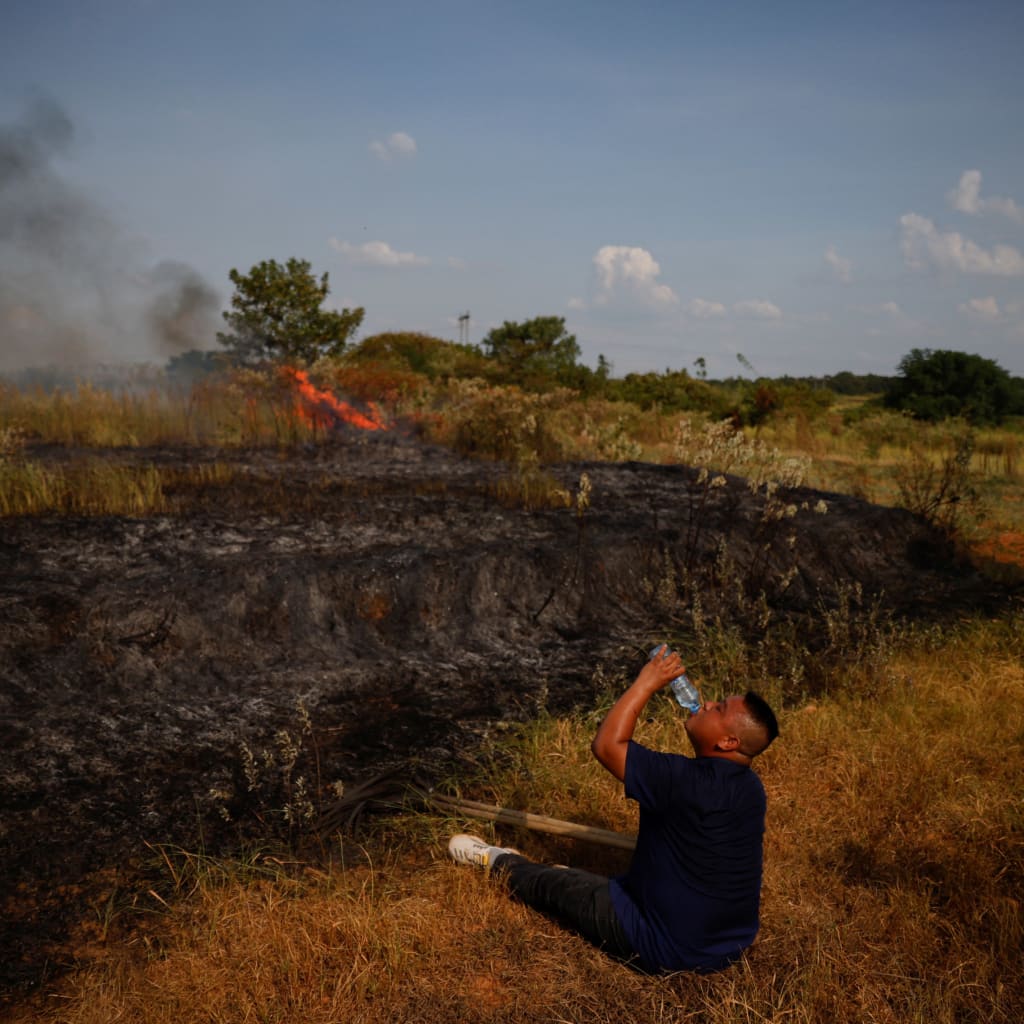 Macron’s Algeria Trip, Drought in China, Anniversary of Afghanistan Withdrawal, and More Image