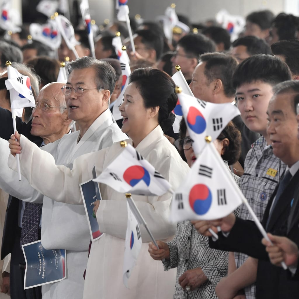 <p>South Korean President Moon Jae-in and his wife Kim Jung-sook at a ceremony to mark the 74th anniversary of Korea’s liberation from Japan’s 1910-45 rule, at the Independence Hall of Korea in Cheonan on August 15, 2019.</p>
