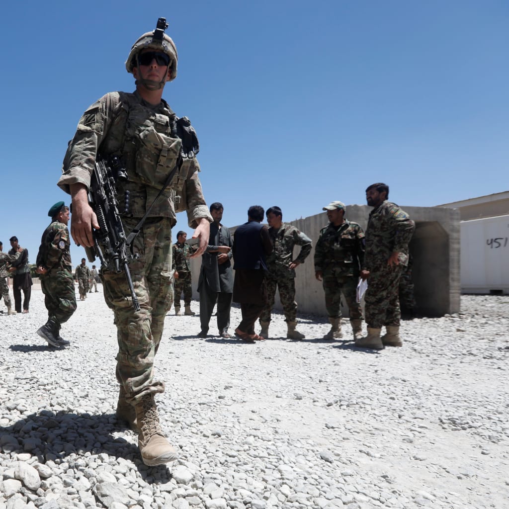 <p>A U.S. soldier keeps watch at an Afghan National Army base in Afghanistan, August 5, 2018.</p>
