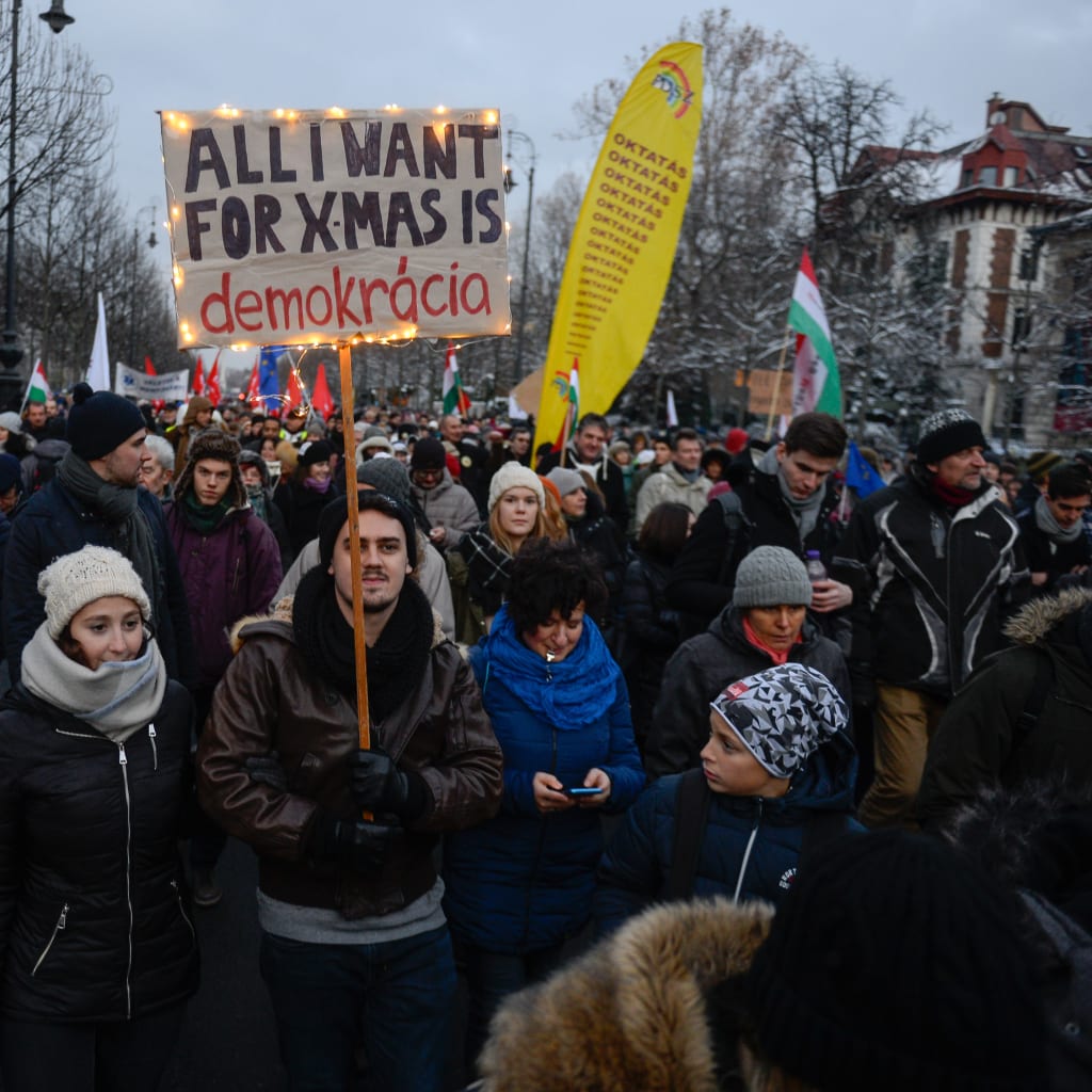<p>Protesters rally against new laws passed by the right-wing conservative government of Viktor Orban in Budapest, Hungary.</p>
