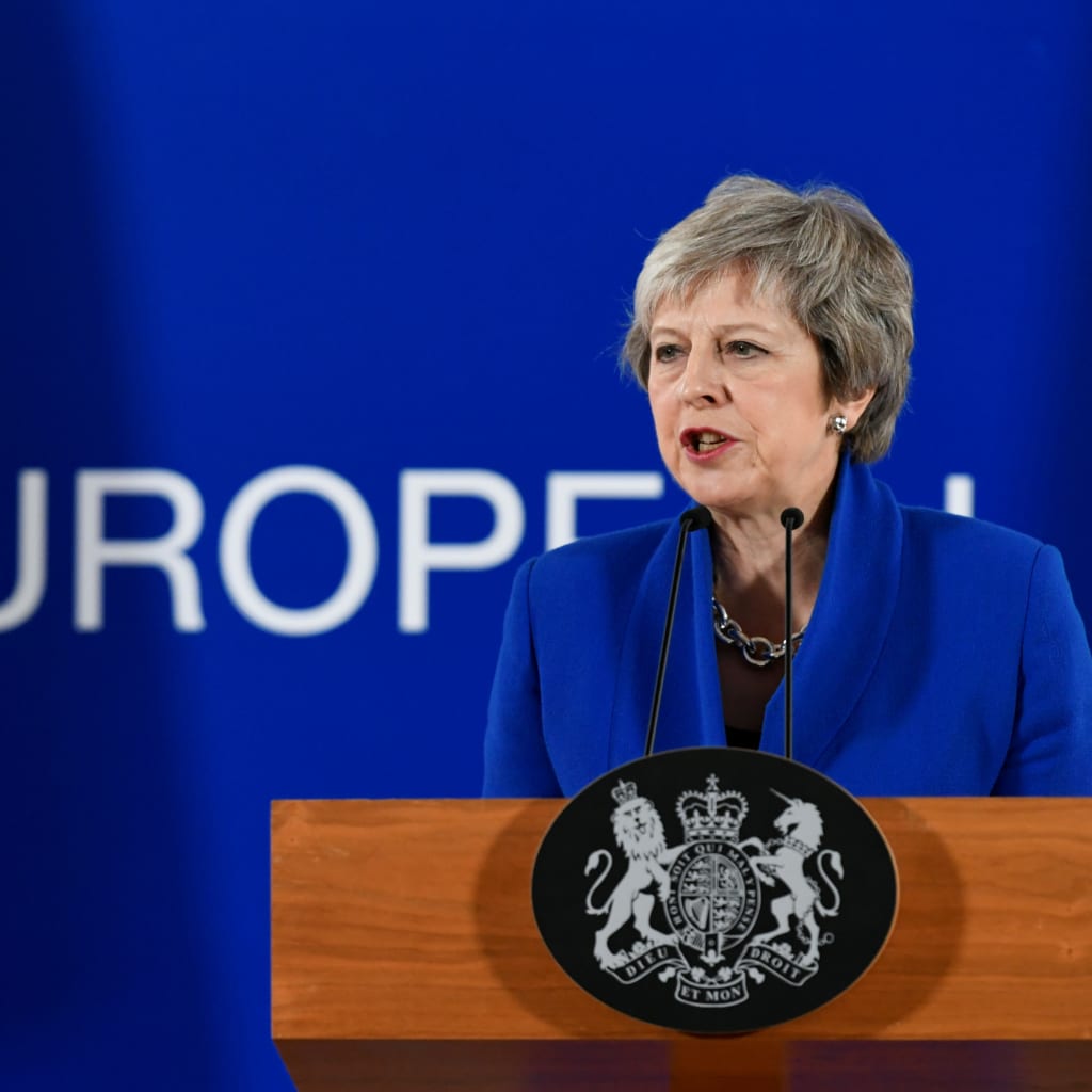 <p>Britain’s Prime Minister Theresa May attends a news conference after an extraordinary EU leaders summit to finalise and formalise the Brexit agreement in Brussels, Belgium on November 25, 2018. </p>