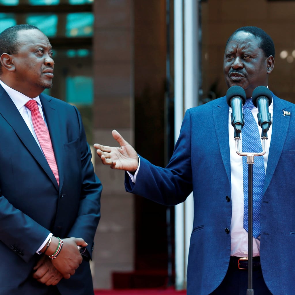 <p>Kenya’s opposition leader Raila Odinga of the National Super Alliance (NASA) coalition flanked by Kenya’s President Uhuru Kenyatta (L) address a news conference after meeting at the Harambee house office in Nairobi, Kenya March 9, 2018.</p>
