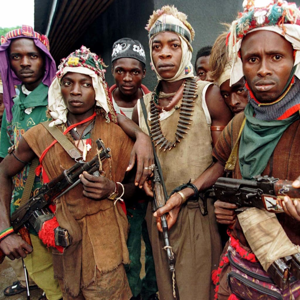 <p>The Kamajors were trained and armed to protect their homelands from the Revolutionary United Front rebels and undisciplined elements of the Sierra Leone military, who they accuse of looting and committing atrocities against them. June 15, 1997.</p>
