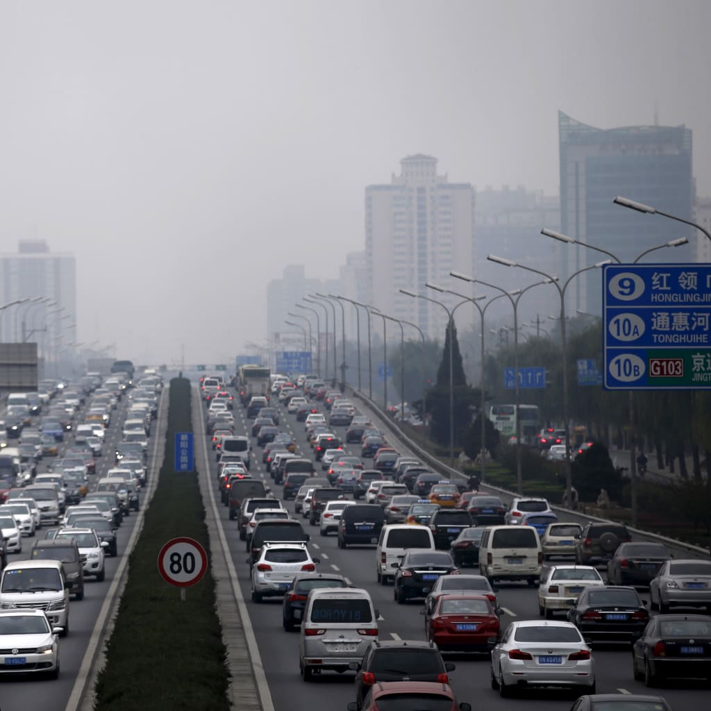 <p>A view of traffic during a hazy day in Beijing, China, November 18, 2015. Some global automakers are worried that China is pushing its weight around as the world’s biggest car market – by enforcing its own, often outdated, vehicle certification standards </p>

