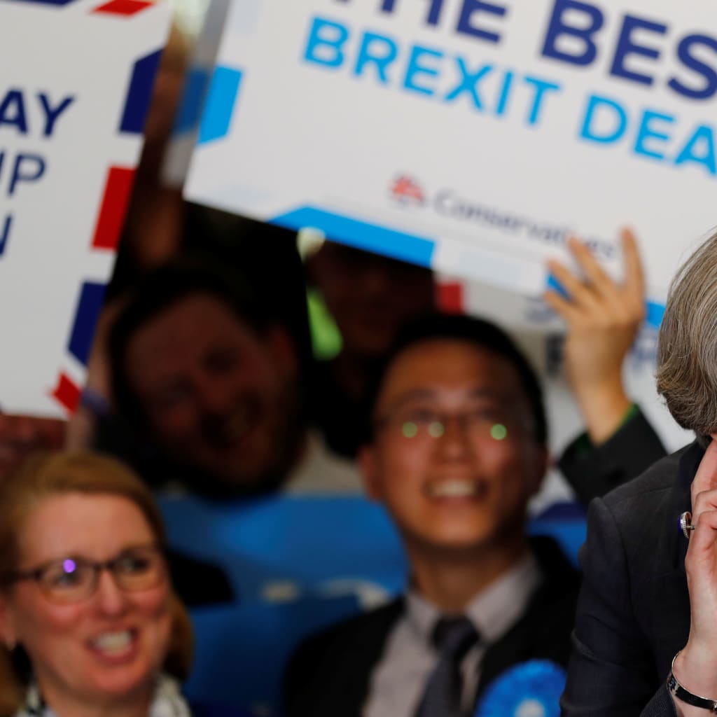 <p>British prime minister Theresa May reacts at a campaign event in Britain on June 1, 2017.</p>
