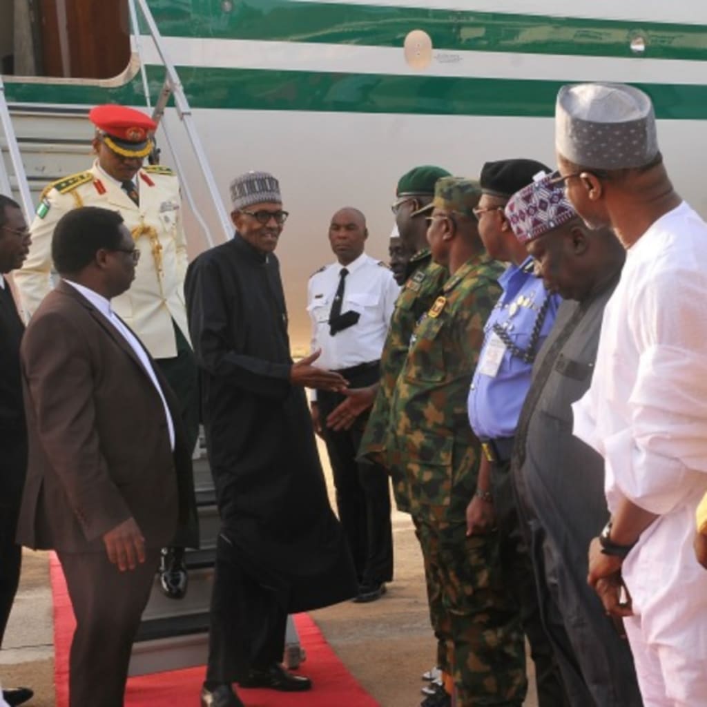 <p>Nigeria’s President Muhammadu Buhari returns from a medical trip in London at the Nigeria Airforce Base in Kaduna, Nigeria, March 10, 2017. (Reuters/Stringer)</p>