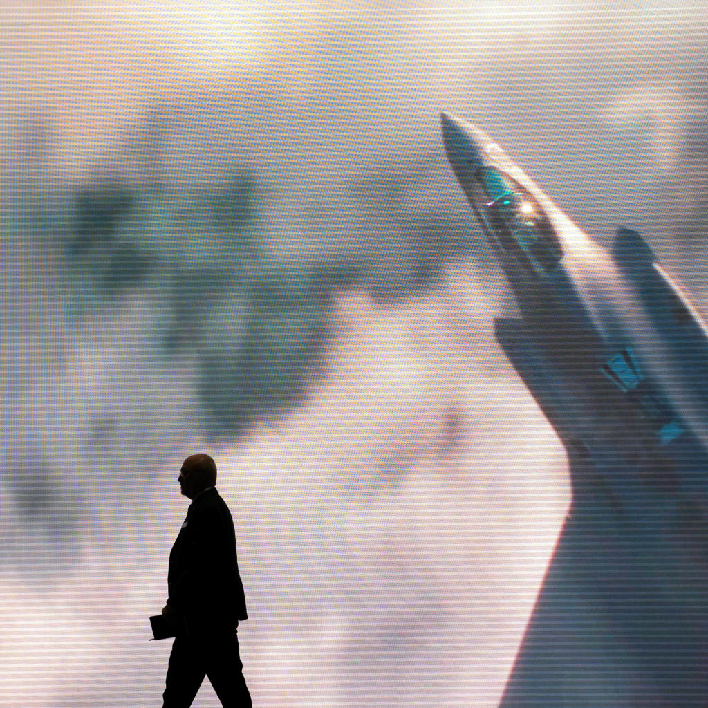 <p>A man walks past a Lockheed Martin video presentation during the Association of the United States Army annual meeting and exposition in Washington, D.C., October 14, 2024. </p>
