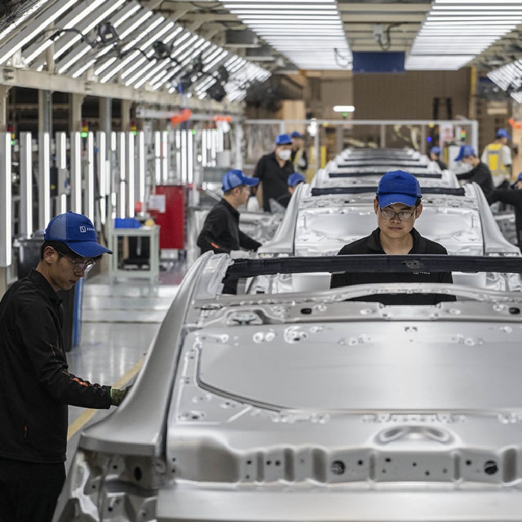 <p>Workers check vehicle frames on the production line for electric vehicle maker Zeekr at its factory in Ningbo, China, on May 29, 2025.</p>
