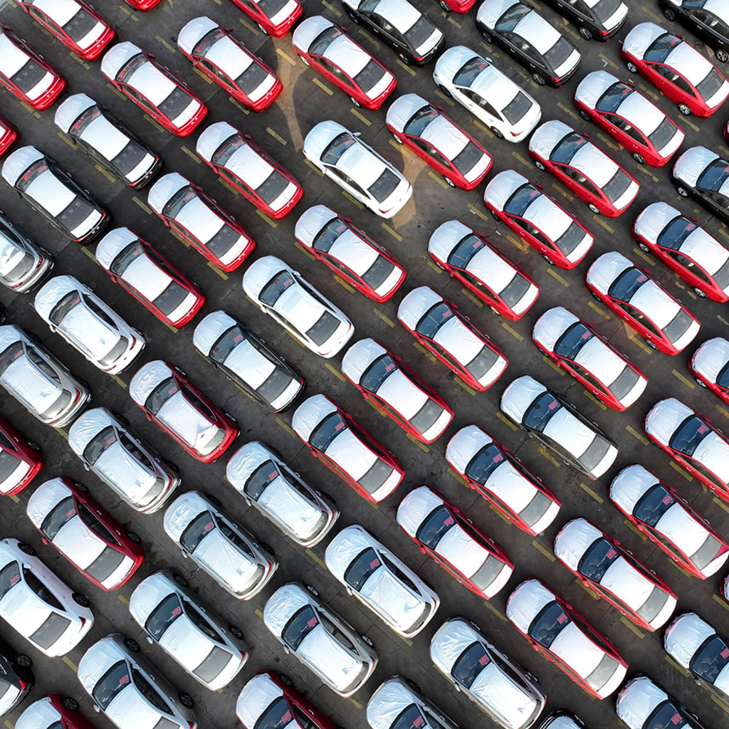 <p>Export-bound vehicles wait to be loaded onto roll-on/roll-off ships at Lianyungang Port in China, on December 1, 2025. </p>
