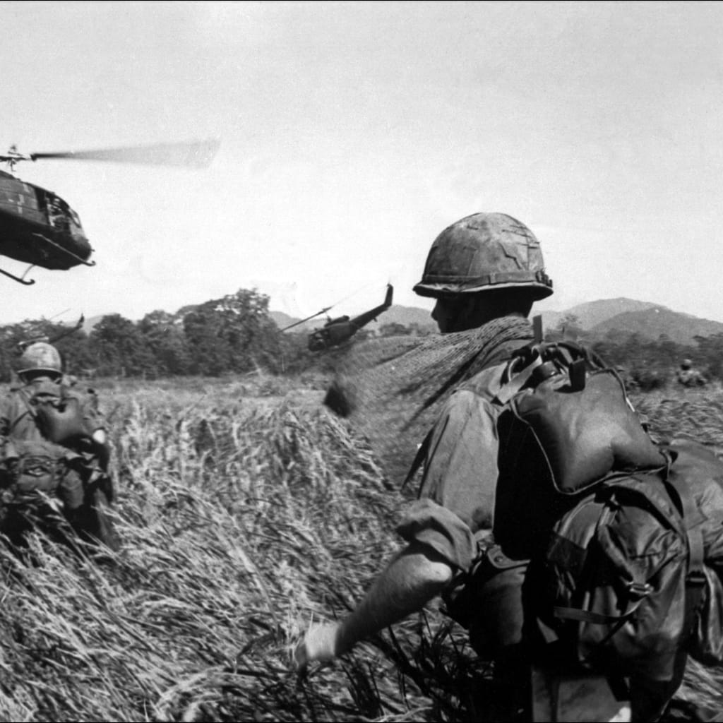 American soldiers of the 173th airborne are evacuated by helicopter from a Vietcong position, December 11, 1965.