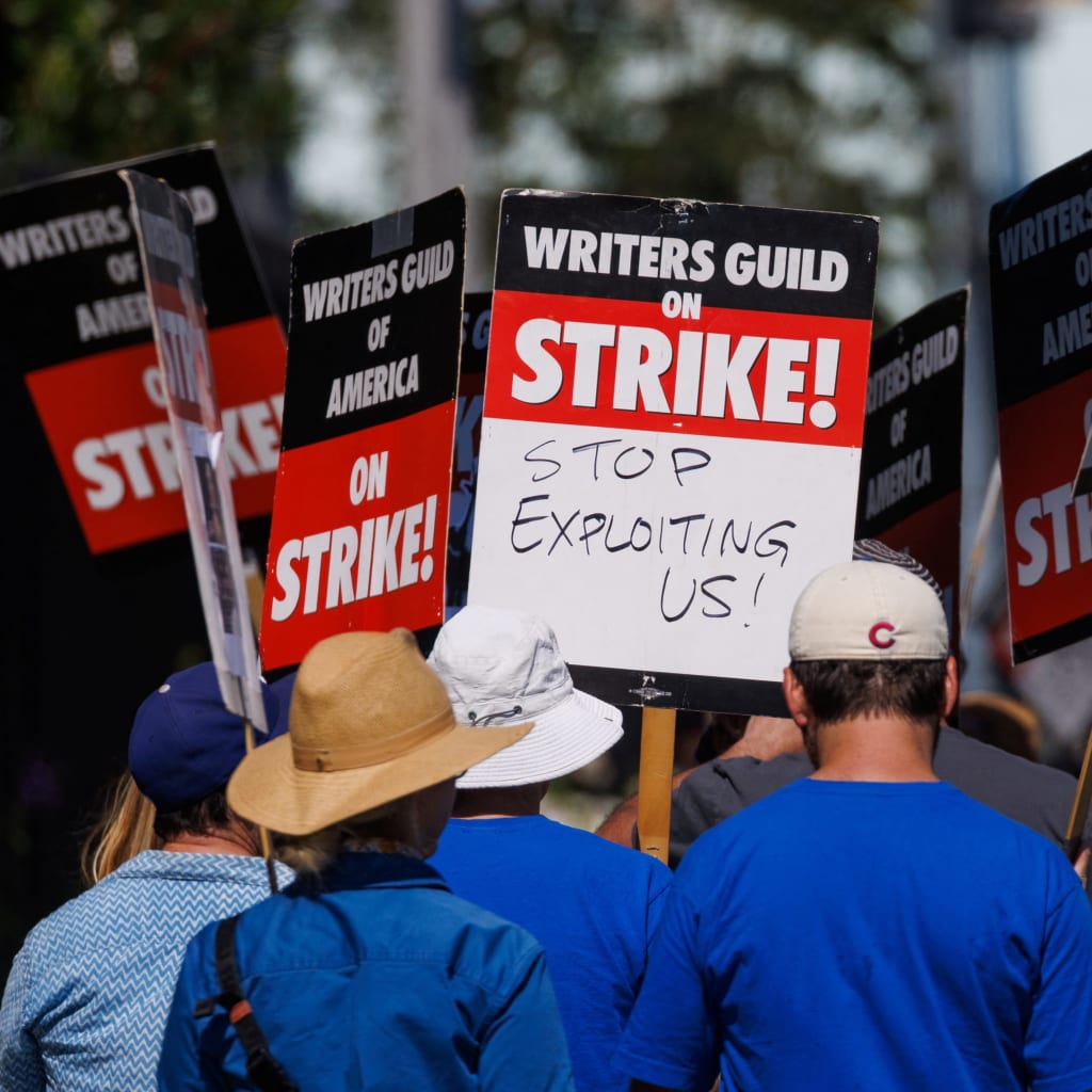 Striking Hollywood writers walk