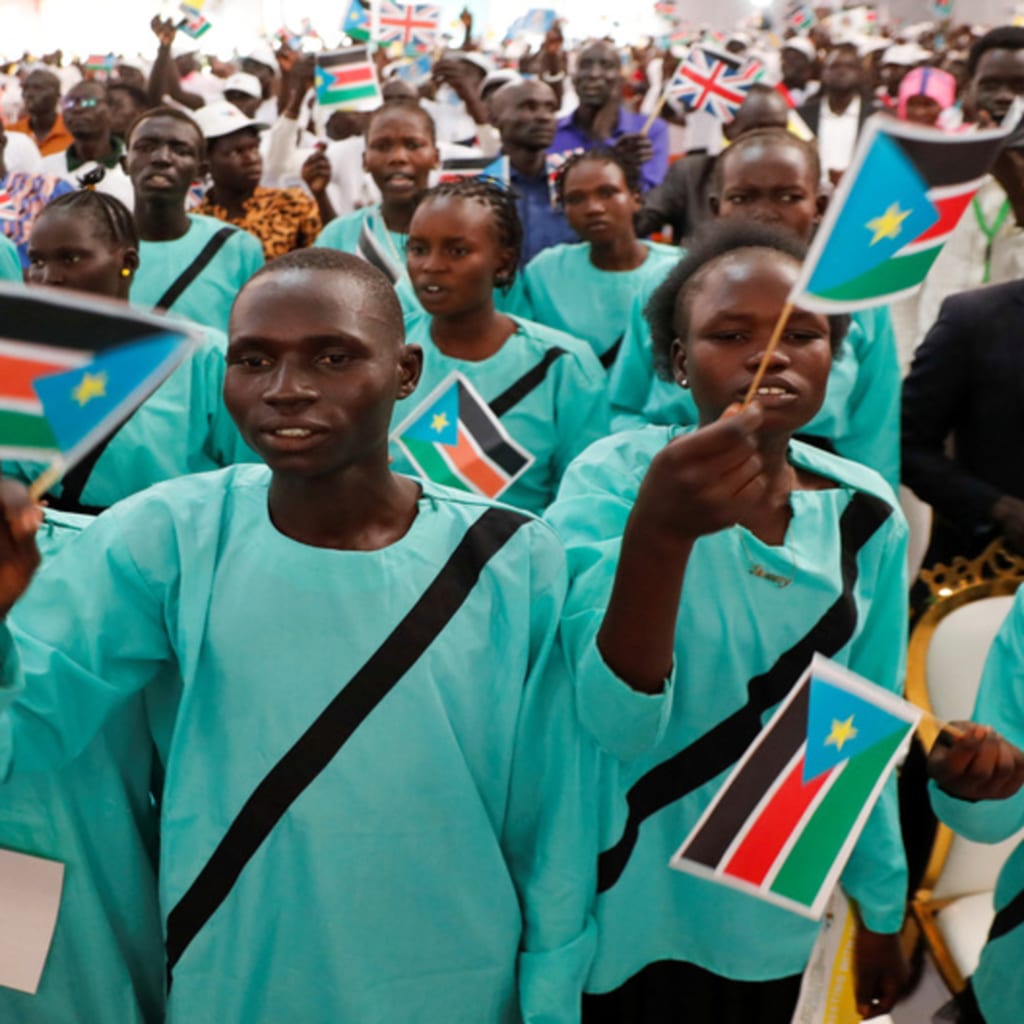 <p>Internally displaced persons react as Pope Francis arrives to meet them at the Freedom Hall during his apostolic journey, in Juba, South Sudan, February 4, 2023.</p>

