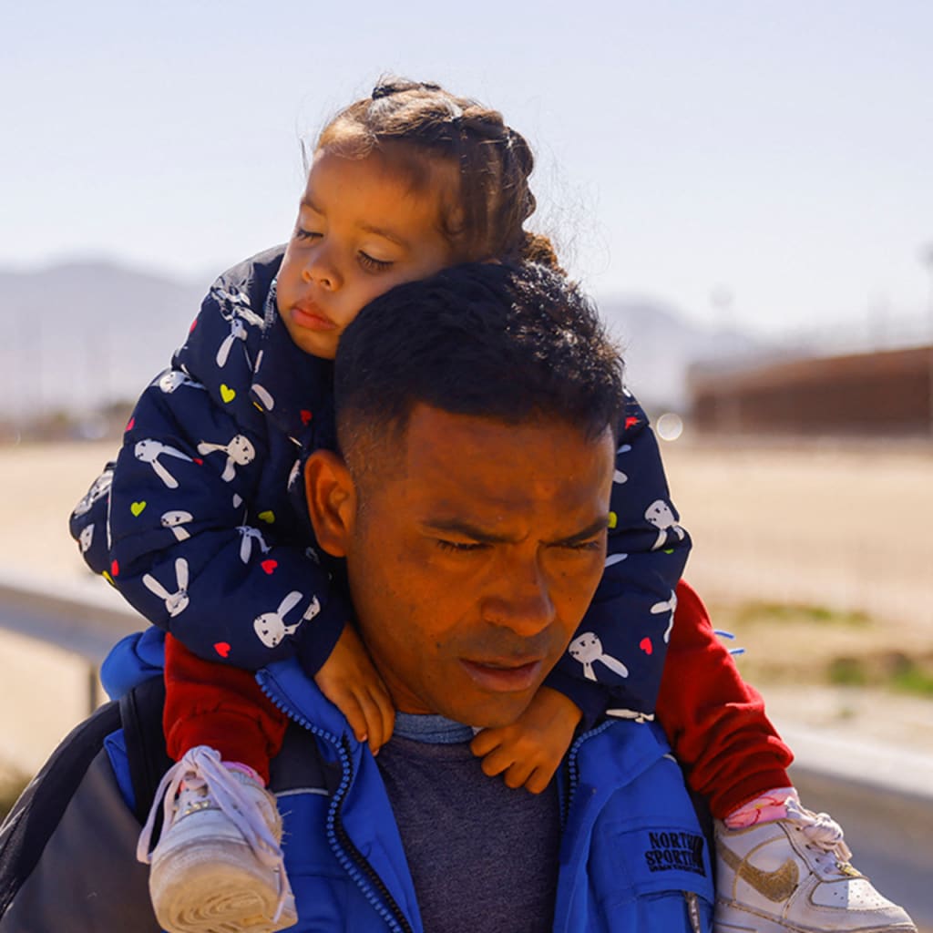 asylum seekers father and daughter