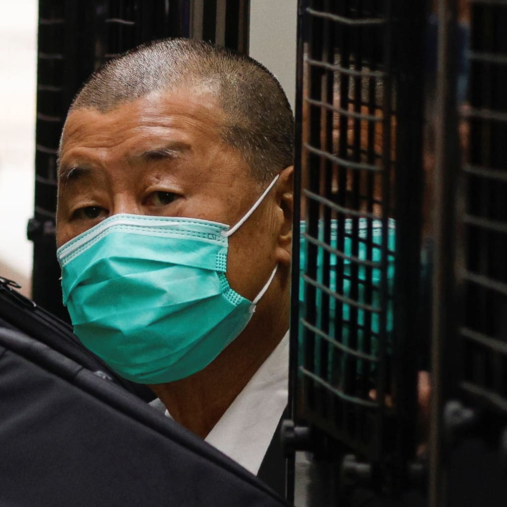 <p>Media mogul Jimmy Lai, founder of Apple Daily, arrives the Court of Final Appeal by prison van in Hong Kong</p>
