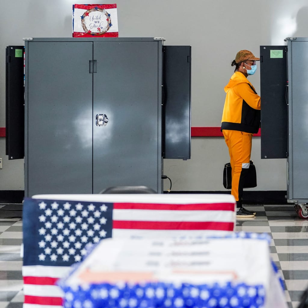 <p>Voters cast their ballots on the first day of early voting in Atlanta, Georgia, U.S. </p>
