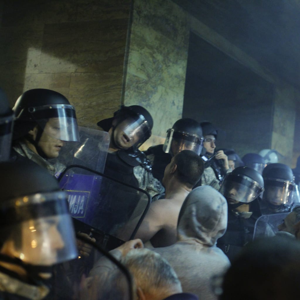 <p>Demonstrators storm into Macedonia’s parliament in Skopje on April 27, 2017.</p>
