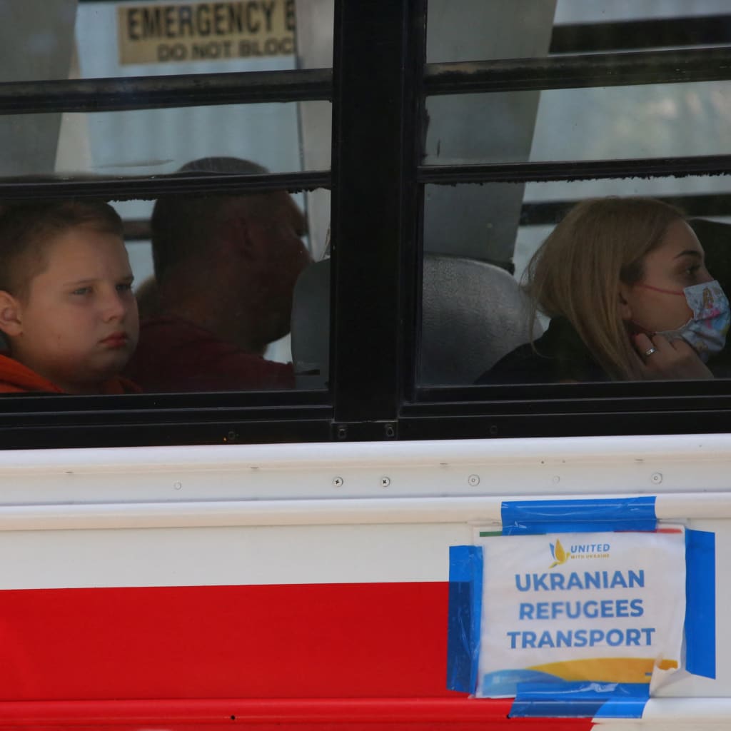 <p>Ukrainians wait to cross the U.S. border in Tijuana</p>
