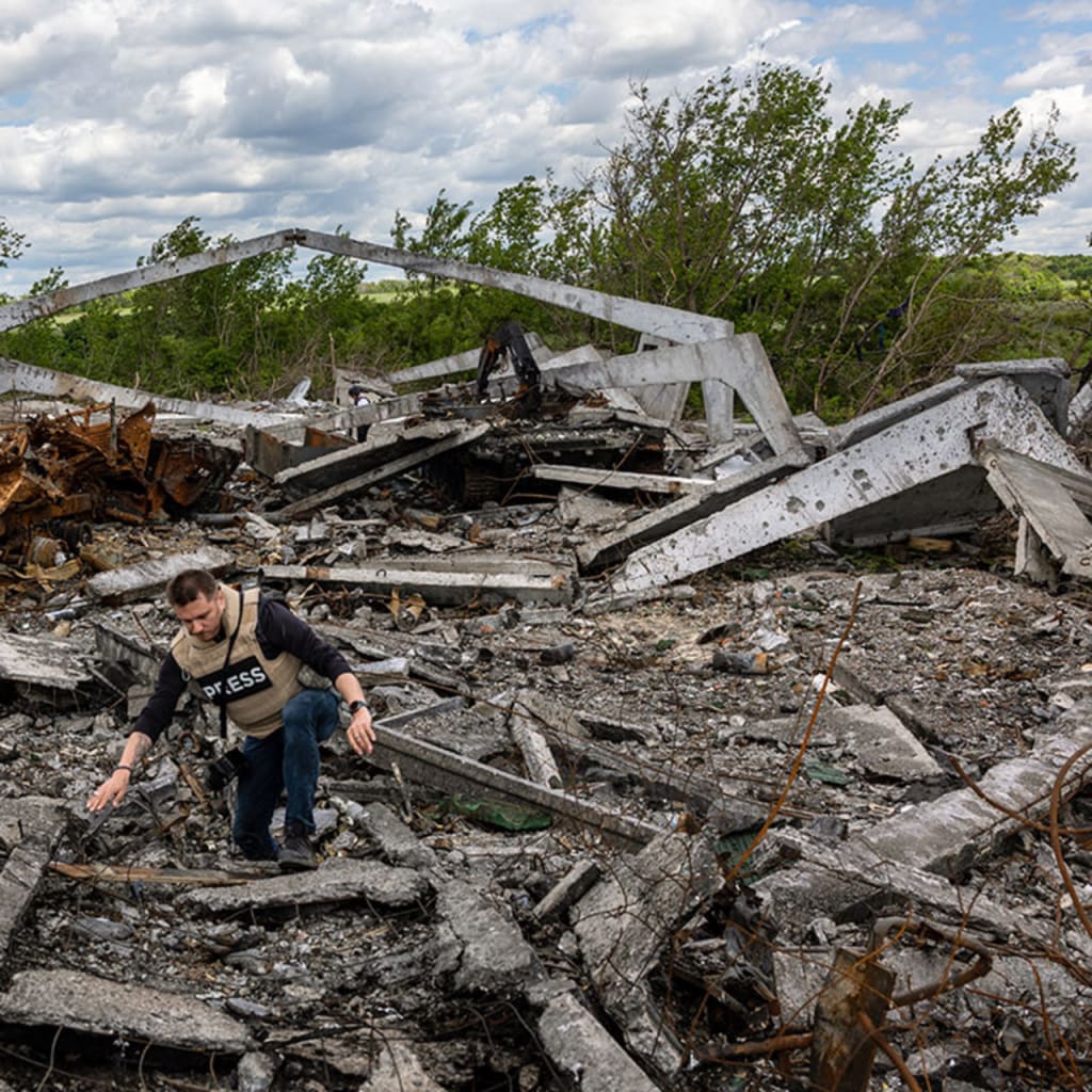 Covering the War in Ukraine: The View From Journalists